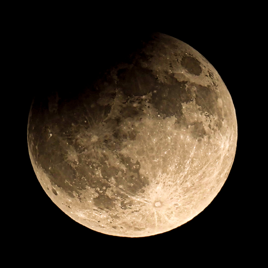 The Harvest Super Partial Eclipse Moon | Focal World