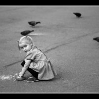 Russian-girl-feeds-pigeons