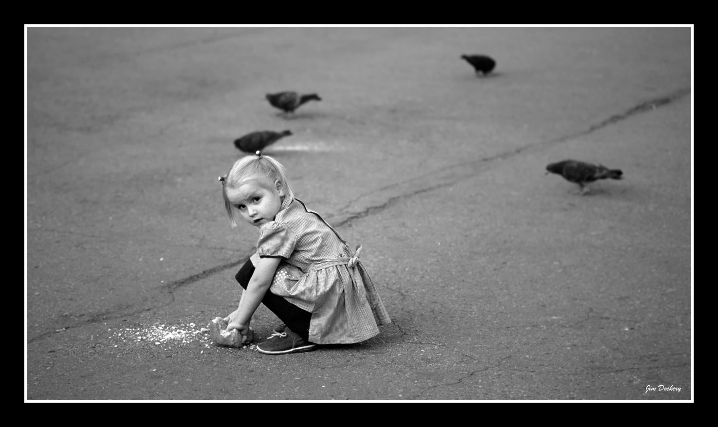 Russian-girl-feeds-pigeons